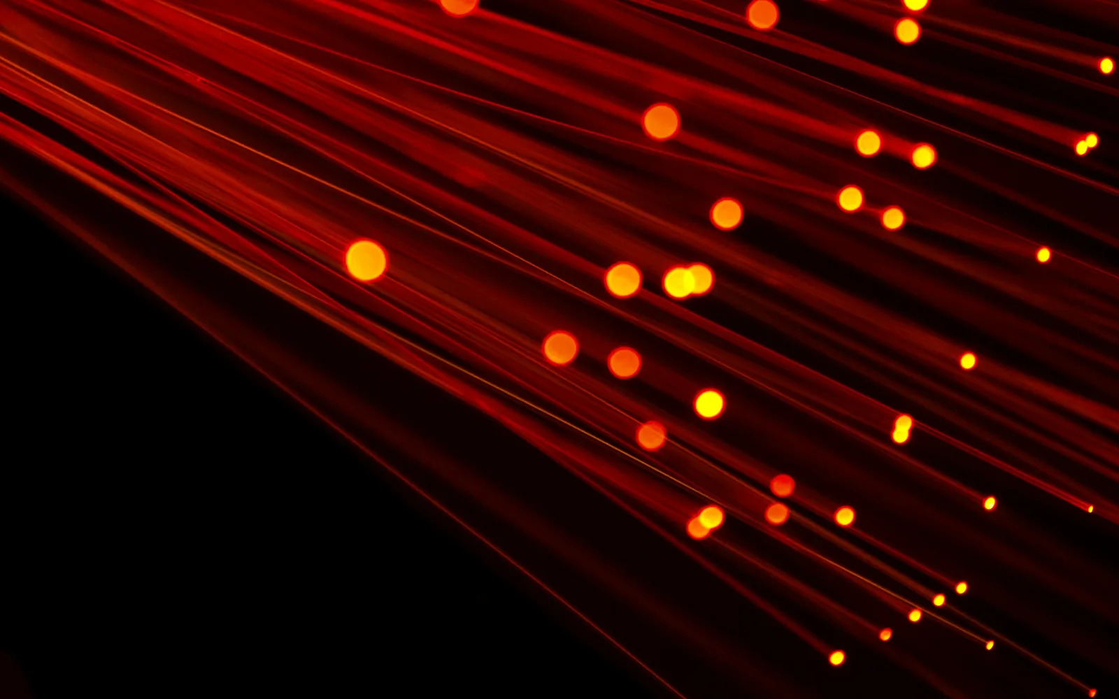 Glowing fibre-optic strands in the dark