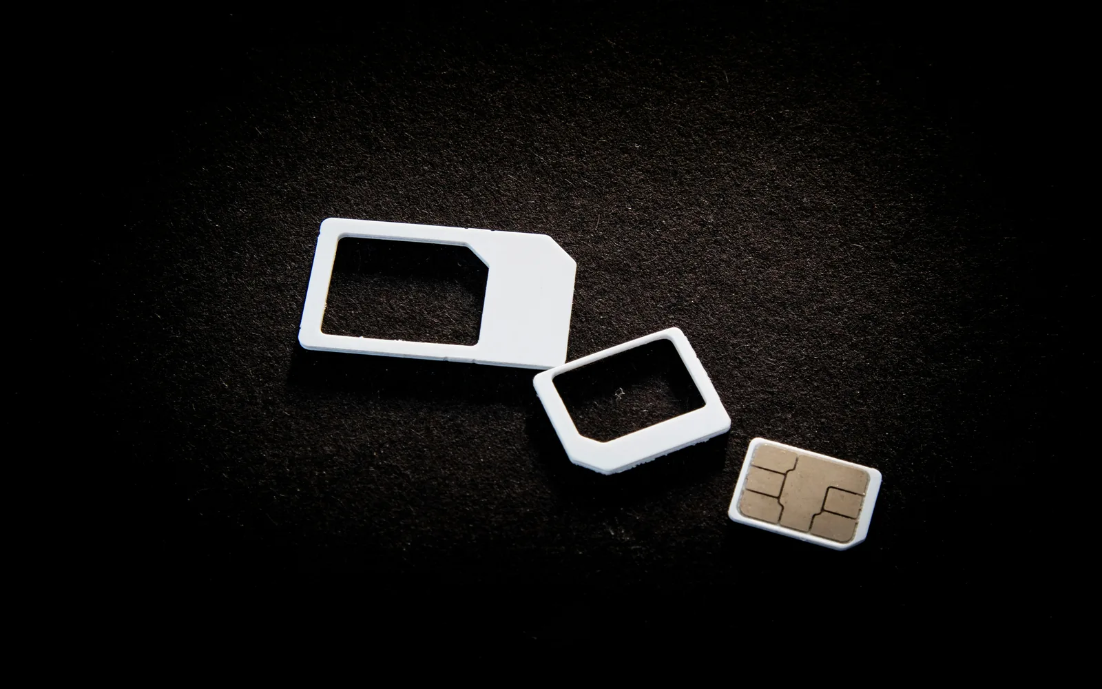 Sim cards and their adaptors are on display.
