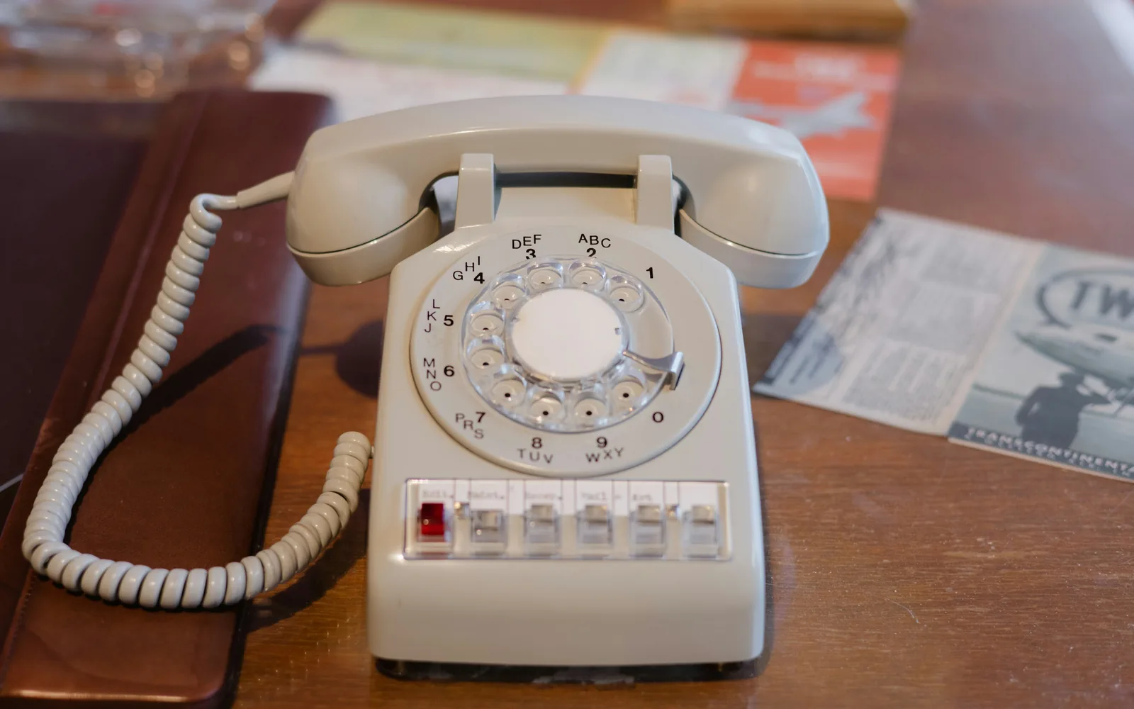 an old style telephone sitting on a table