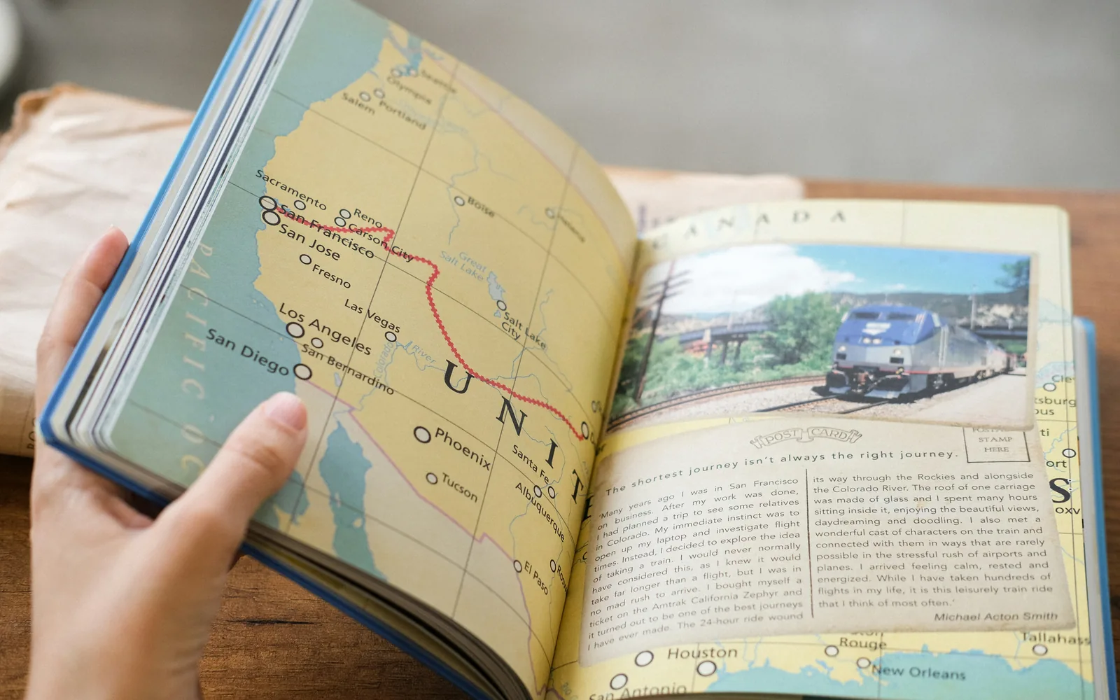 A person flips through a travel journal.