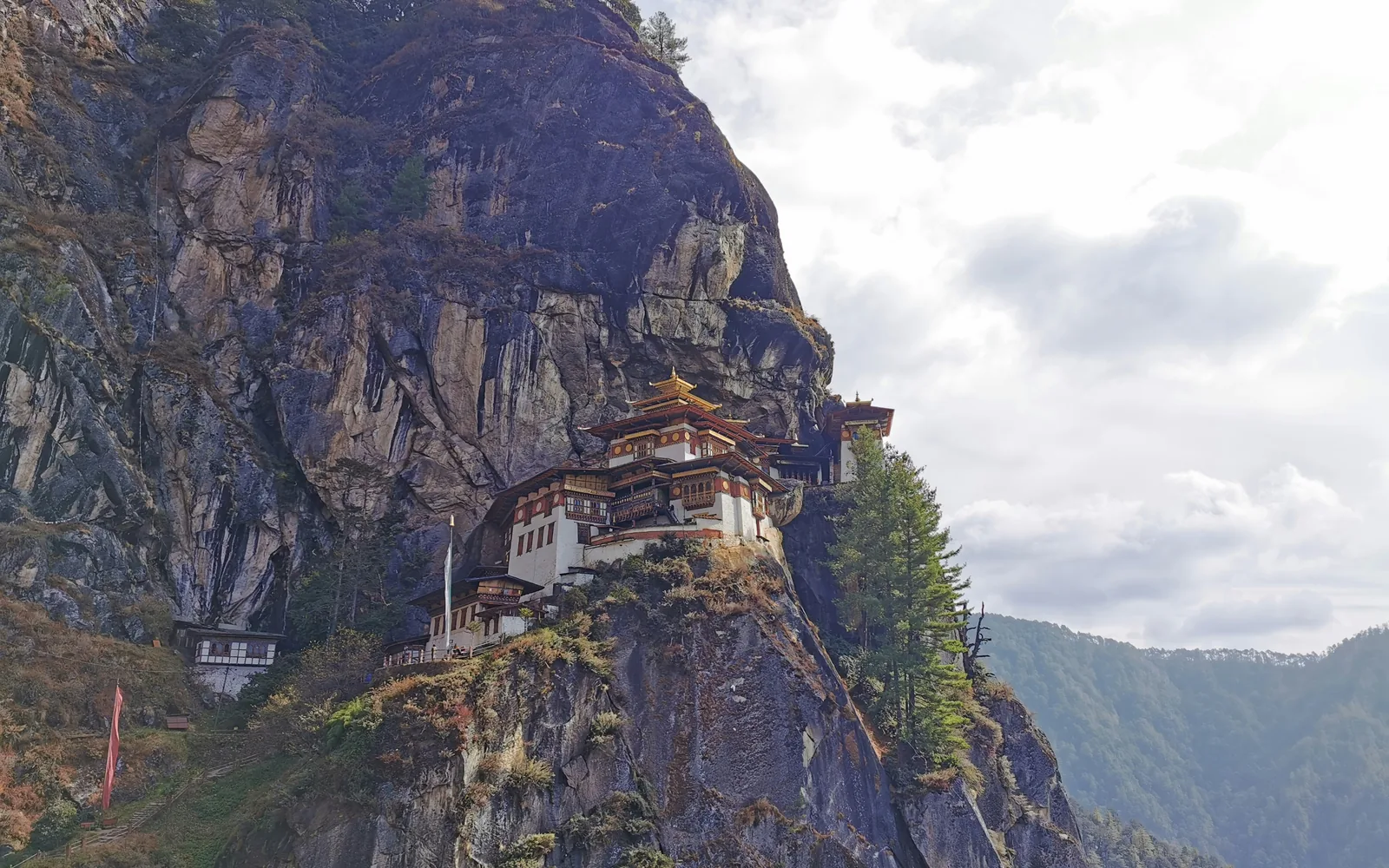 Arguably the most popular of Bhutan’s monasteries, the Taktshang Goemba (Tiger’s Nest Monastery) is perched on the side of a 3000 feet cliff in Paro valley, above a forest of blue pine and rhododendrons. Find more here: https://trulybhutan.com/attractions-in-paro/taktshang