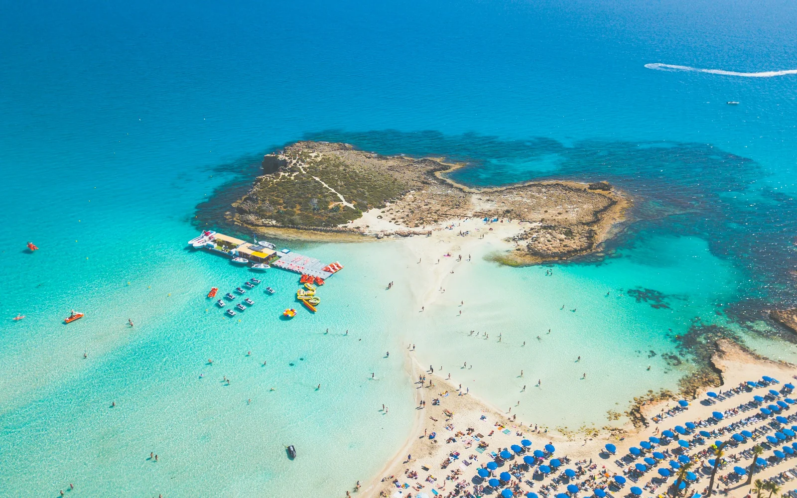 Aerial view of Cyprus coastline with turquoise water and island formations