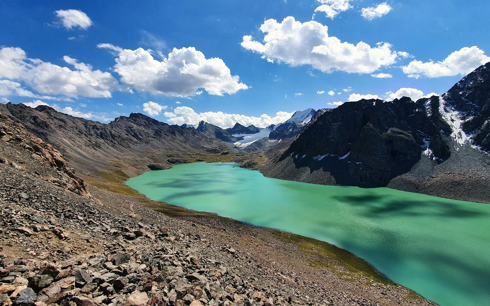 The view of Ala-Kul Lake in Kyrgyzstan