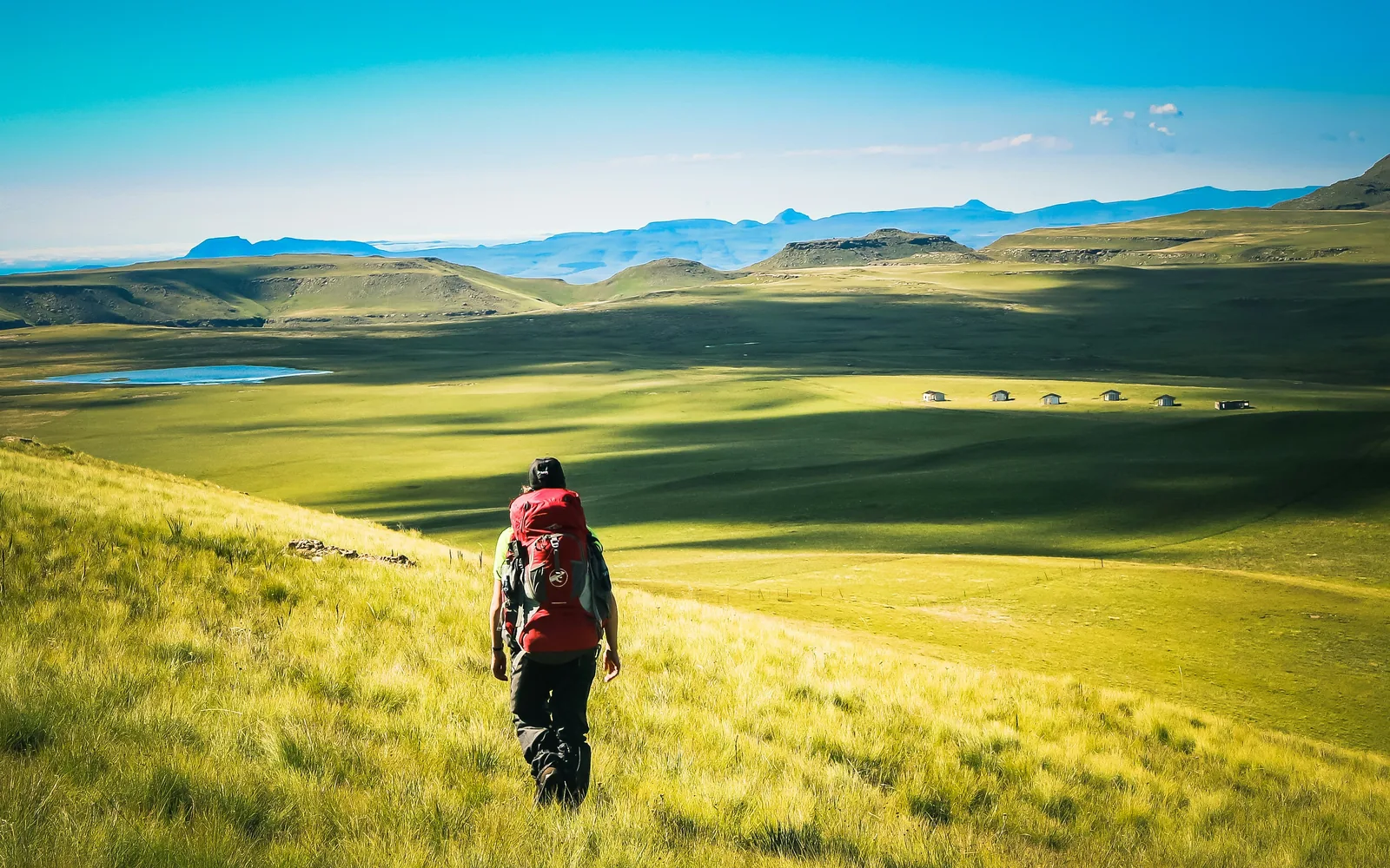 Hiking towards Jonathan's Gate and Bushman's Nek Pass in the Southern Drakensberg.