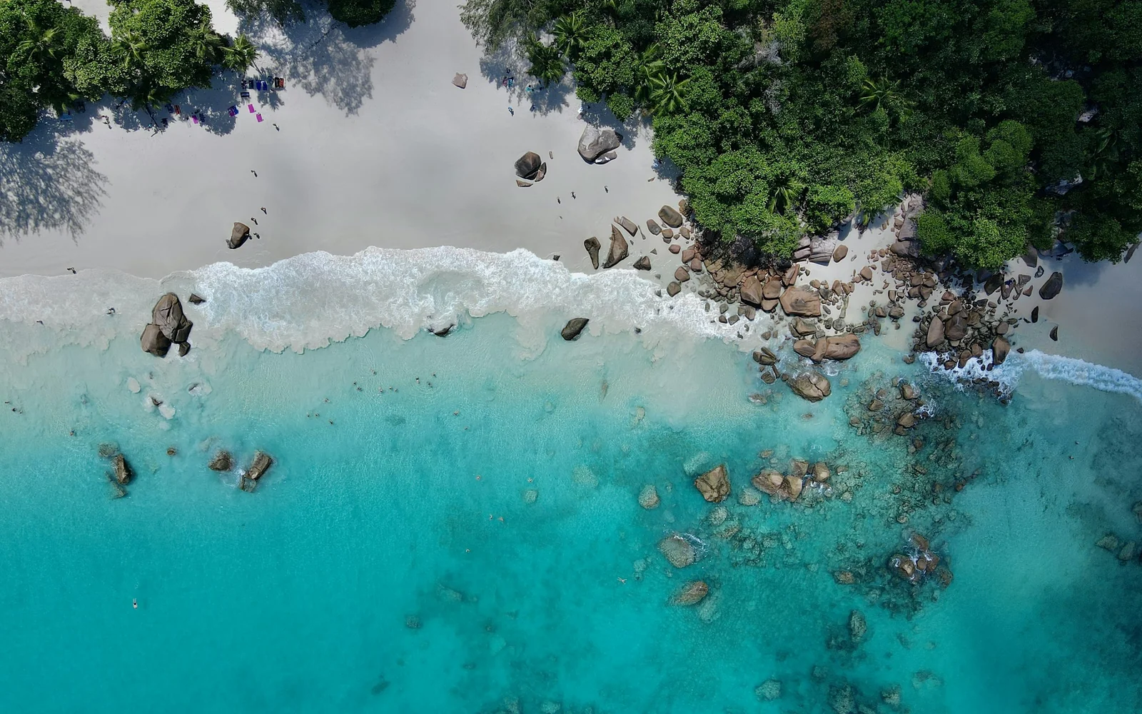 Aerial view of a Seychelles beach with turquoise water