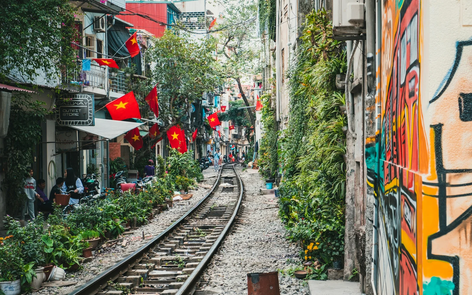 Hanoi Train Street — a train track running through a narrow alley, Vietnam